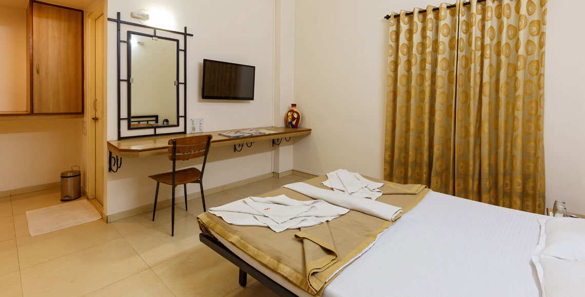 Deluxe Room Hotel Rajpurush Kolhapur